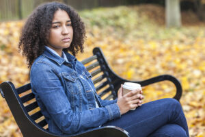 Depressed - mixed race African American girl teenager female 
